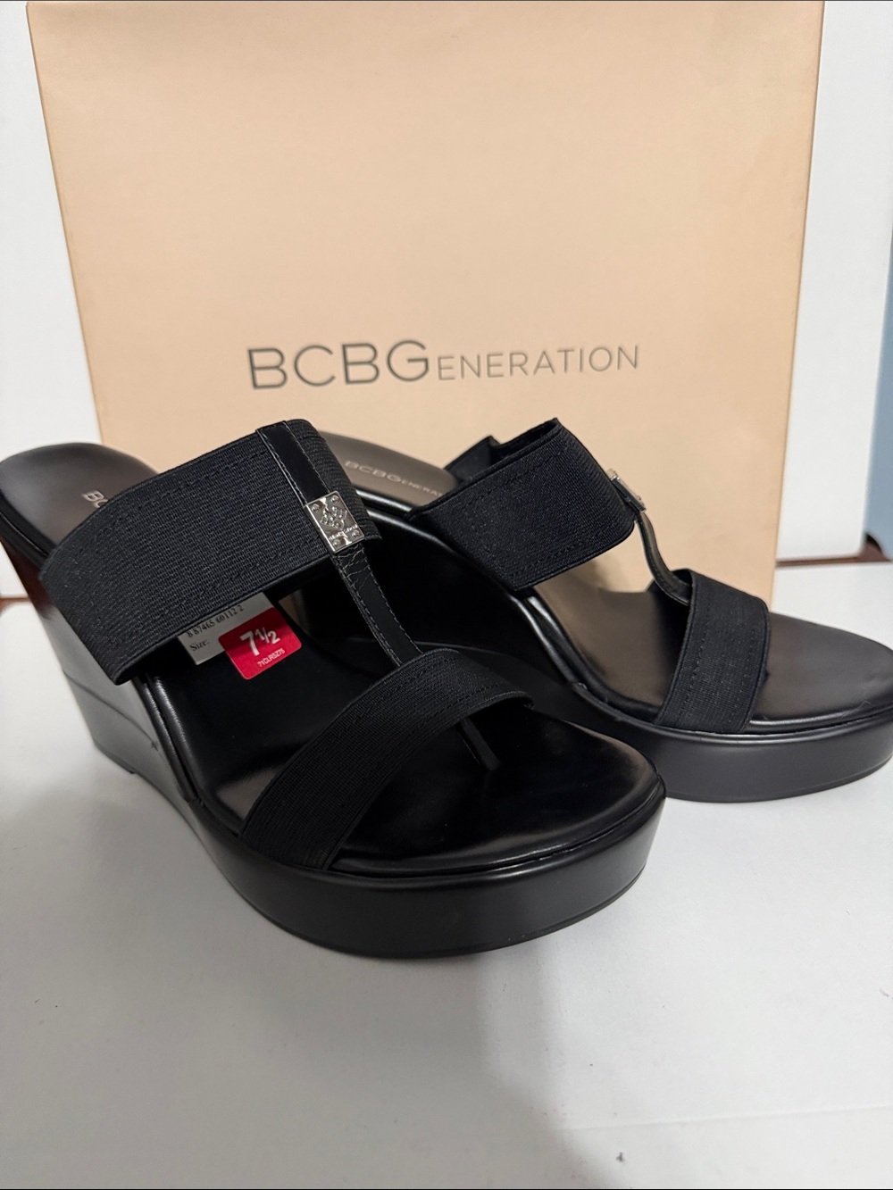 BCBGeneration Black Elastic Strap Wedge Sandals